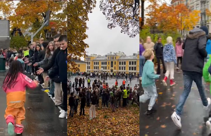 en gruppe mennesker som går på en gate